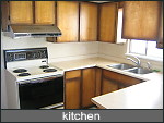 full size kitchen with lots of cabinets